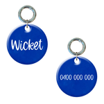 Personalised blue dog tag with pet name and contact number engraved, round metal ring