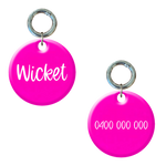 Fluorescent pink round dog tag with name and phone number, custom engraved pet ID accessory