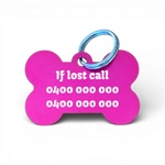 Pink bone-shaped aluminium dog tag with dogs name  and phone number engraved.