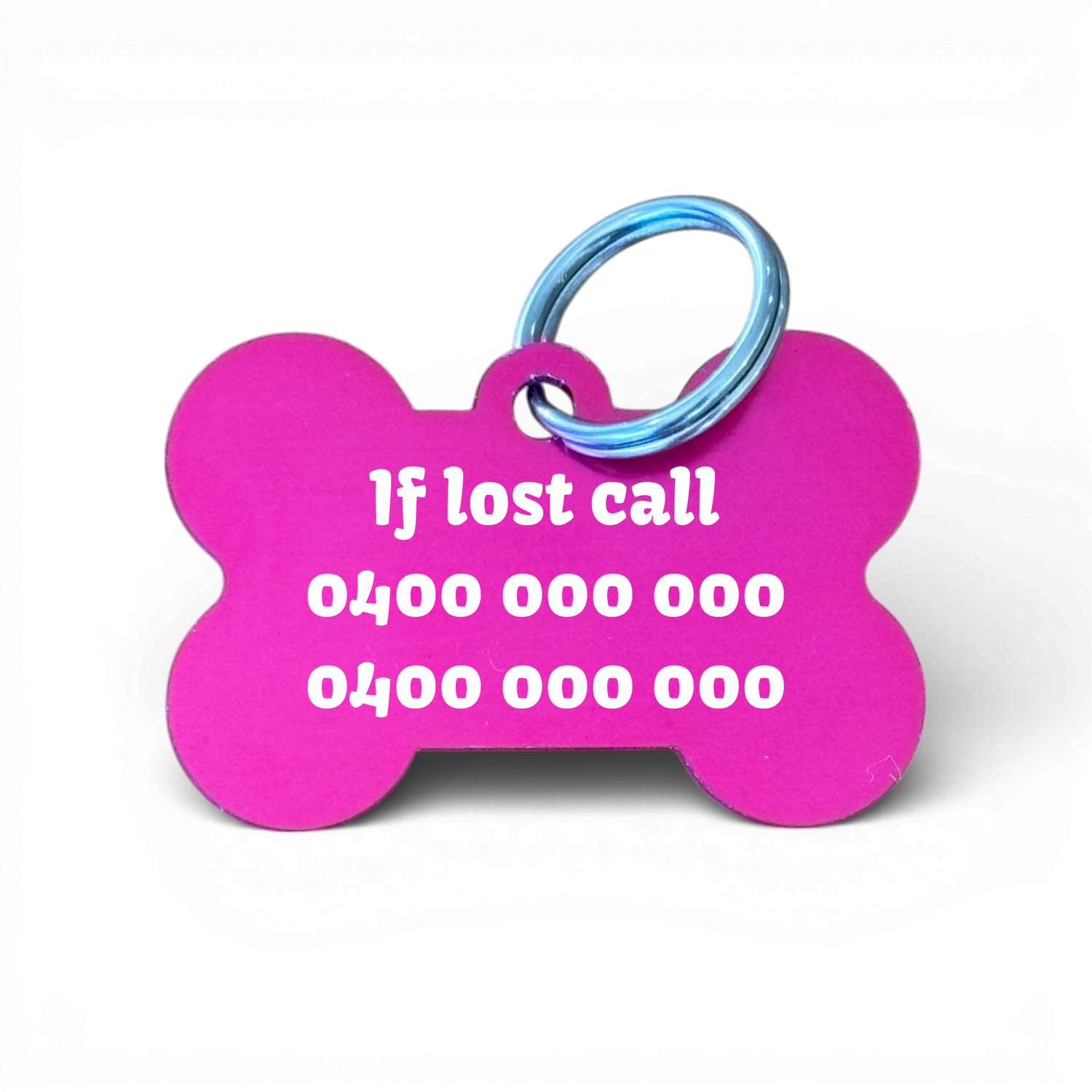 Pink bone-shaped aluminium dog tag with dogs name  and phone number engraved.