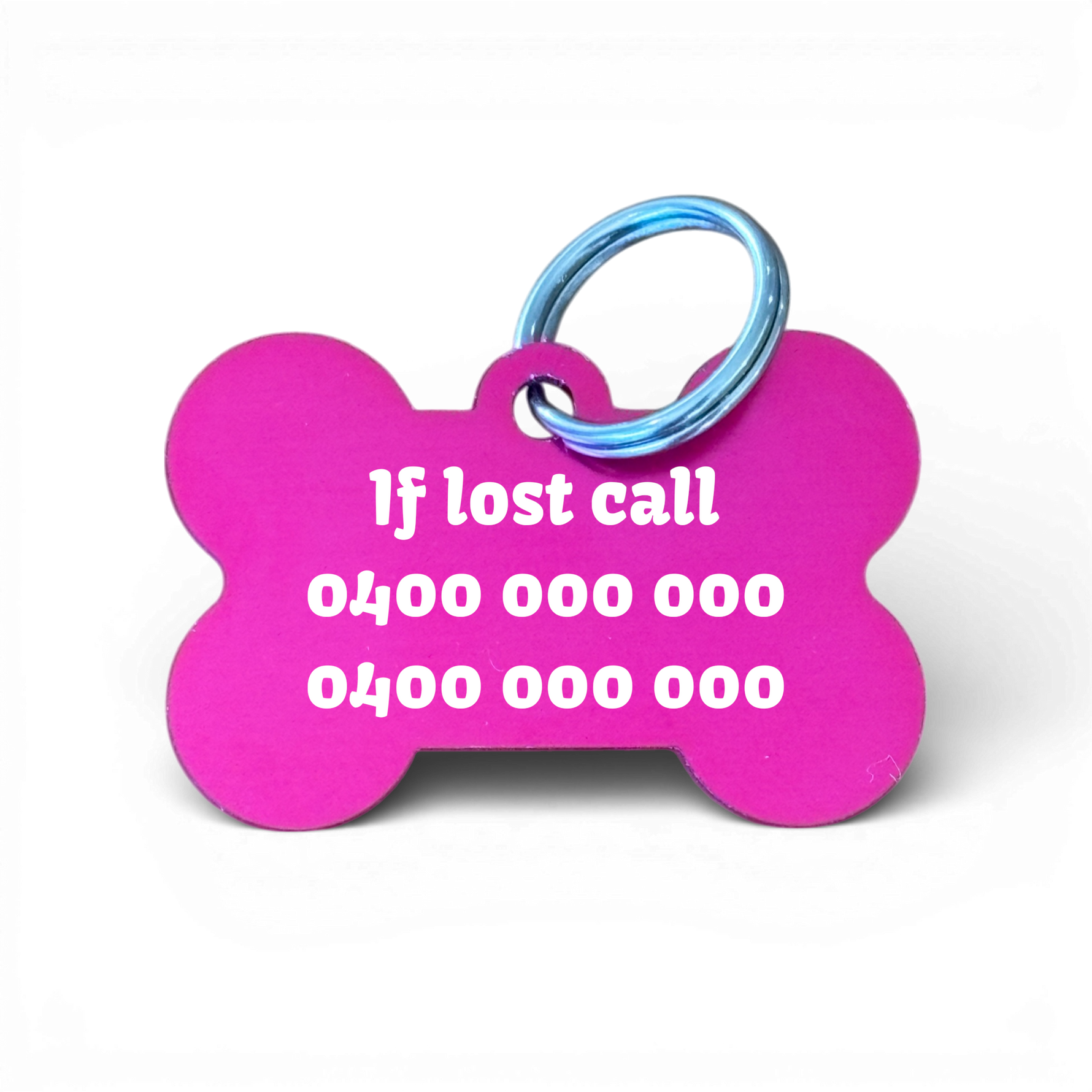 Pink bone-shaped aluminium dog tag with dogs name  and phone number engraved.